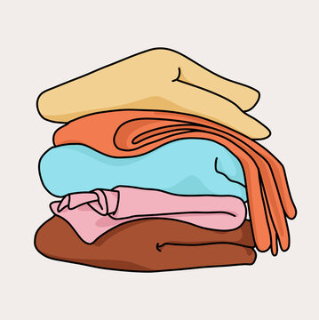 Stack of Folded Clothes in Soft Tones