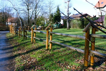 Fototapeta premium Wooden fence for horses. Countryside in Autumn