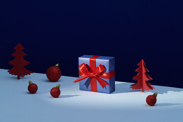 Colorful Christmas Present with Red Ornaments and Paper Trees