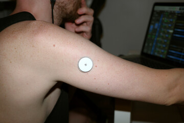 A close-up view of a wearable health monitoring device 