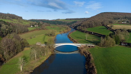 Obraz premium Bigsweir Bridge, road bridge crossing the River Wye, straddling the boundary between the parish of St. Briavels, Gloucestershire, England.