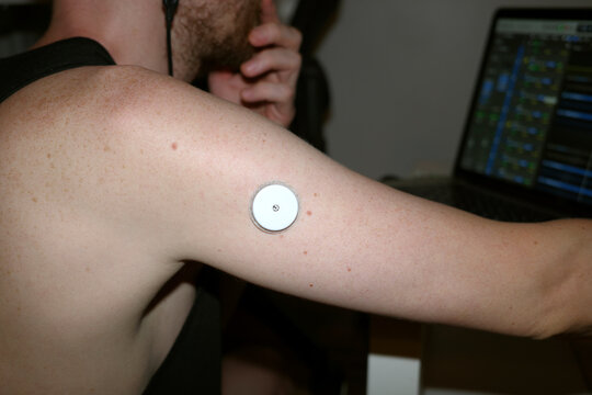 A close-up view of a wearable health monitoring device 