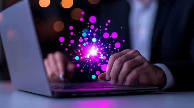 Man using laptop, glowing data points emerge.
