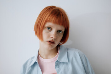 Natural Portrait of Ginger Woman in Blue Shirt