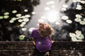 little girl on a jetty