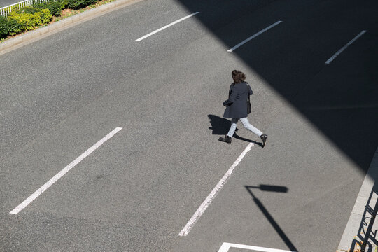 Businessman running in the street
