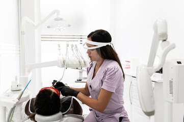 Dental procedure in modern dentistry clinic