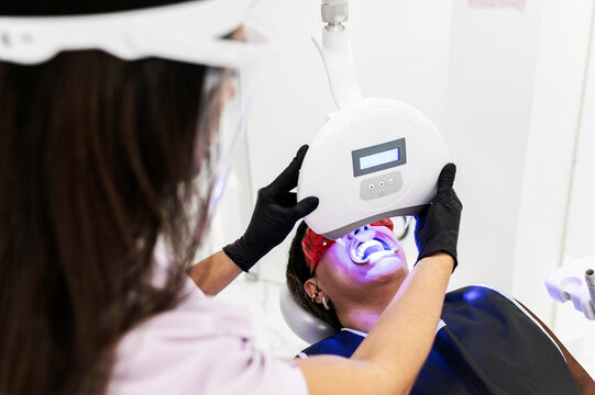 Teeth whitening procedure in dental clinic