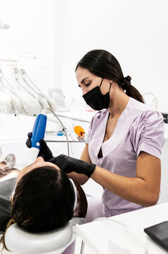 Professional dentist using advanced oral scanner