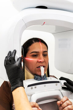 Patient during dental panoramic X-ray scan