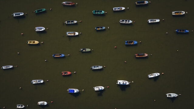 Small Ships Anchored Along the River