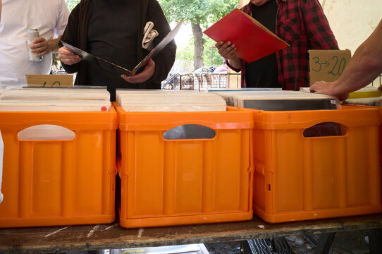 People exploring vinyl records at Kreuzberg Flea market