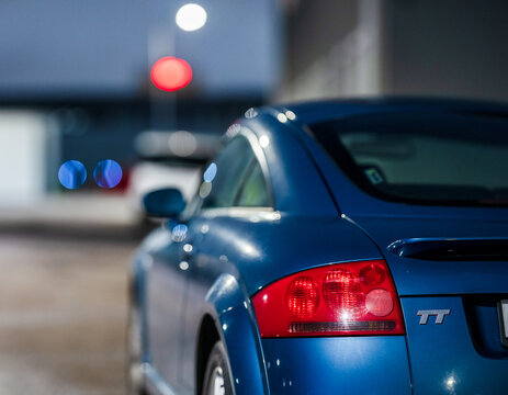 Gothenburg, Sweden - december 22 2024: Rear light of a blue Aidu TT sports car.