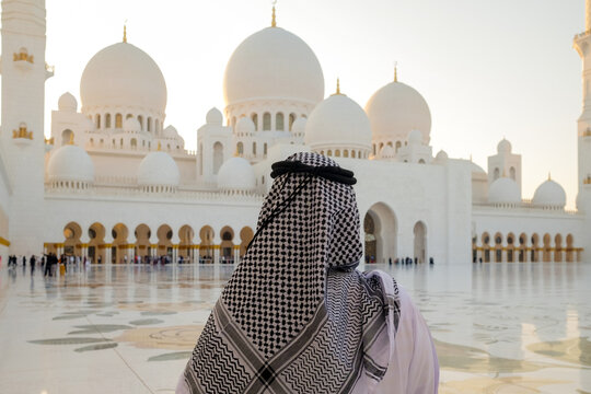 Male in front of Sheik Zayed Mosque
