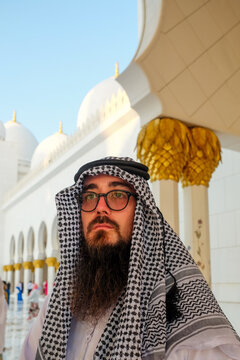 Male in front of Sheik Zayed Mosque
