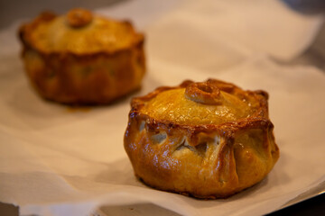 Hand-raised organic pork pies. Organic traditional local UK food. Food photography.