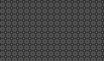 Intricate black and gray geometric pattern with symmetrical floral motifs