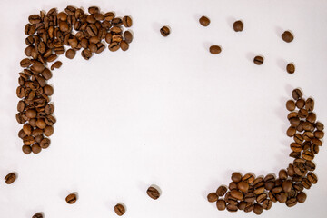 coffee beans in different corners of white canvas with different layout and formats