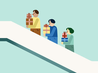 Women with colorful presents on escalator in mall