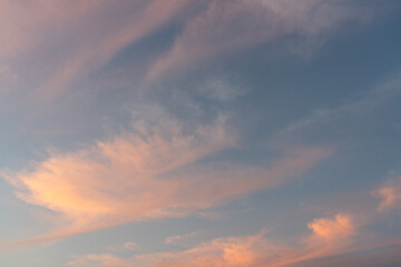 Serene Sunset Sky With Soft Pink Clouds  During Sunset