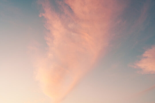 Pink Soft Clouds Against Blue Sky During Sunset