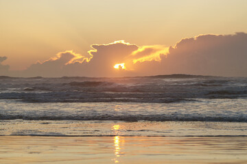 Crepuscular rays at sunset over the ocean