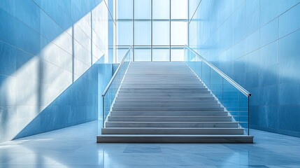 Modern interior staircase with glass railings and blue walls