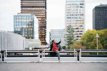 Mature person taking a selfie in city setting