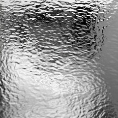 Fototapeta premium A close-up shot of a wet blacktop road