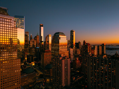 Modern Skyscrapers Reflecting Sunset Glow at Dusk. New York City