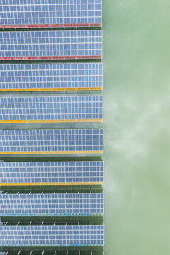 Floating Solar Panels on a Calm Pond
