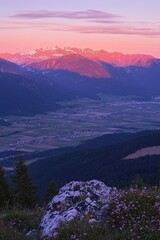 Fototapeta premium Mountain landscape at sunset with hills and valleys