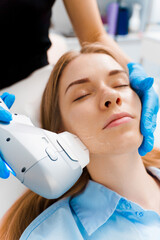 Ultrasound laser facial skincare procedure by beautician. IPL laser rosacea and acne treatment, IPL...