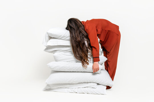 Tired Woman on Pillows