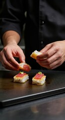 Chef preparing sushi with fresh tuna and crispy rice