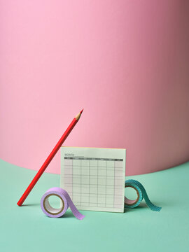 Minimalist Stationery Setup with Calendar and Colored Tape