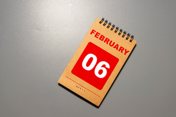 Day 6 of february month, Wooden calendar with date.