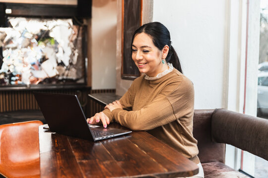 Restaurant Owner Doing Bookkeeping and Administration