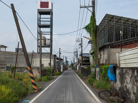Narrow street in Pingtung District of Taiwan. Farming area.
