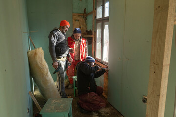 Tradesmen renovating bathroom