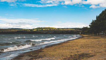 Lake taupo in new zealand water blue colour ripple waves summer day