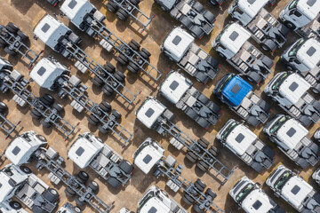 Aerial view of truck fleet in outdoor storage facility