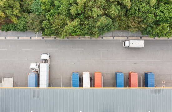 Aerial View of Trucks in a Busy Logistics and Transportation Are