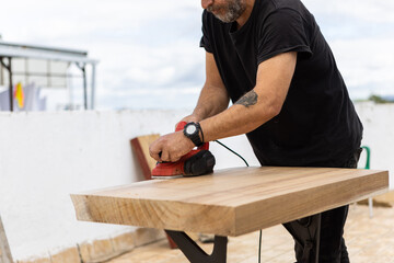 A man doing a DIY carpentry project
