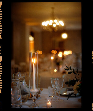 A set table with candles for a gala dinner