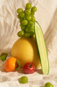 Fruit and veggies on fabric background. Natural still life