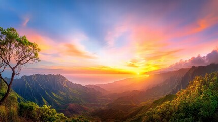 A panoramic view of a mountain sunset, with shadows deepening in the valleys and the sky ablaze with fiery colors.