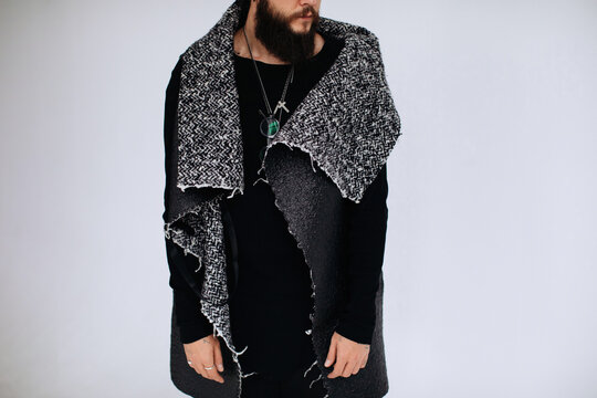 Anonymous bearded man in warm vest