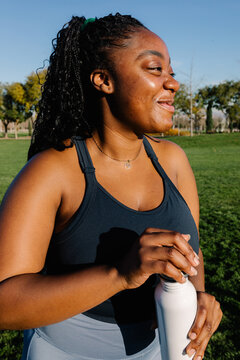 Portrait of a black woman enjoying a sporty morning outdoors
