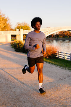 Professional runner of African descent improves his fit by jogging
